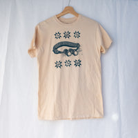 medium | thrifted t-shirt, acorn-dyed, hand blockprinted binoculars and birds
